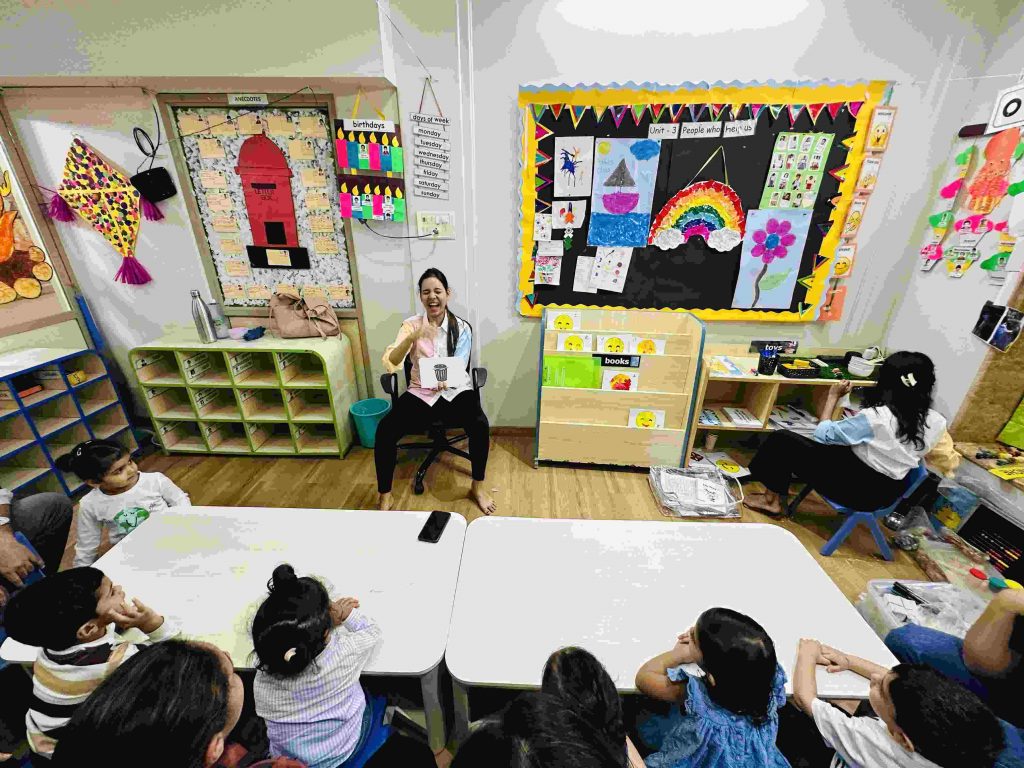 Tickle Right's educator conducting flashcard game with kids
